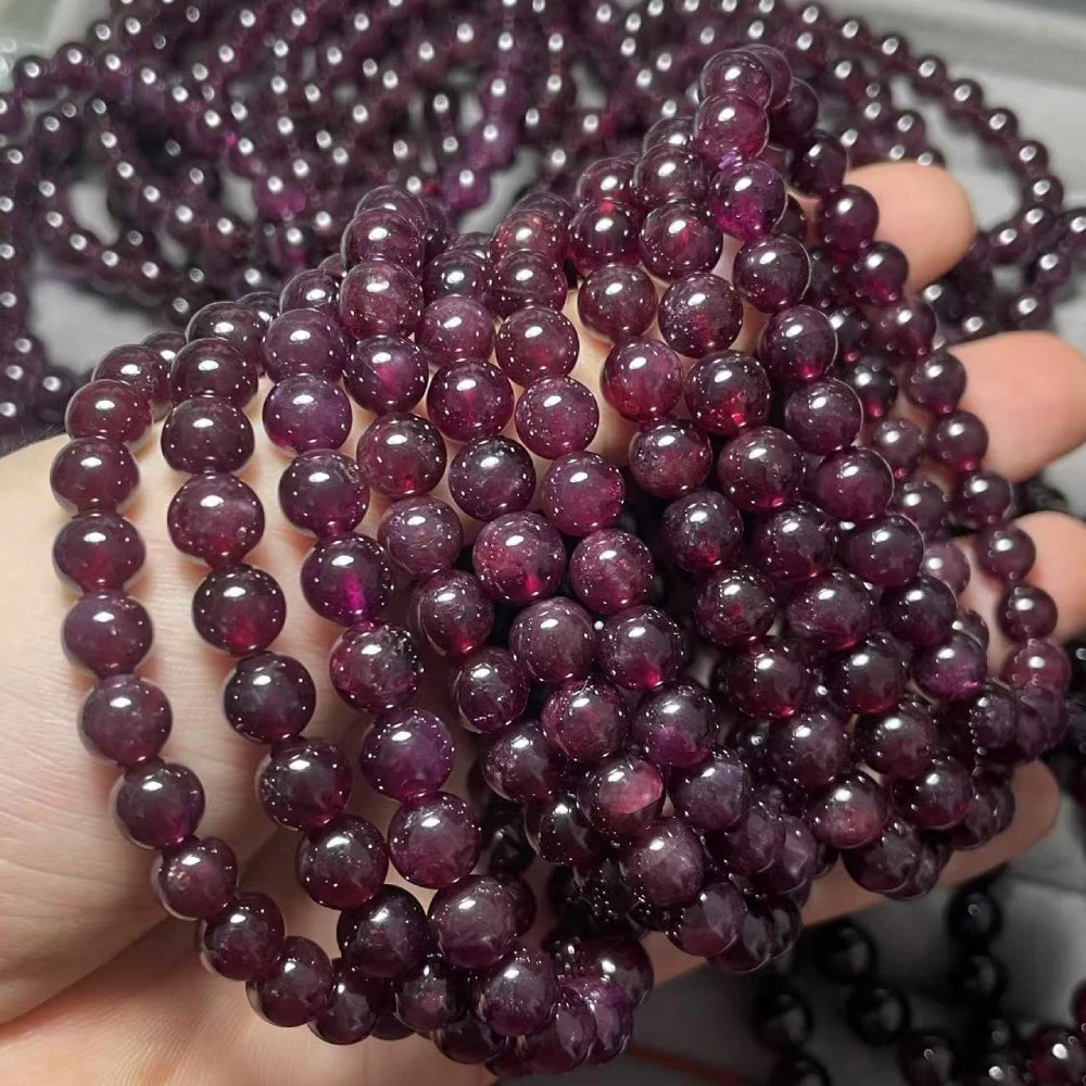 Ca. 7-8 mm natürliche rot-lila Granatarmbandperlen im Großhandel