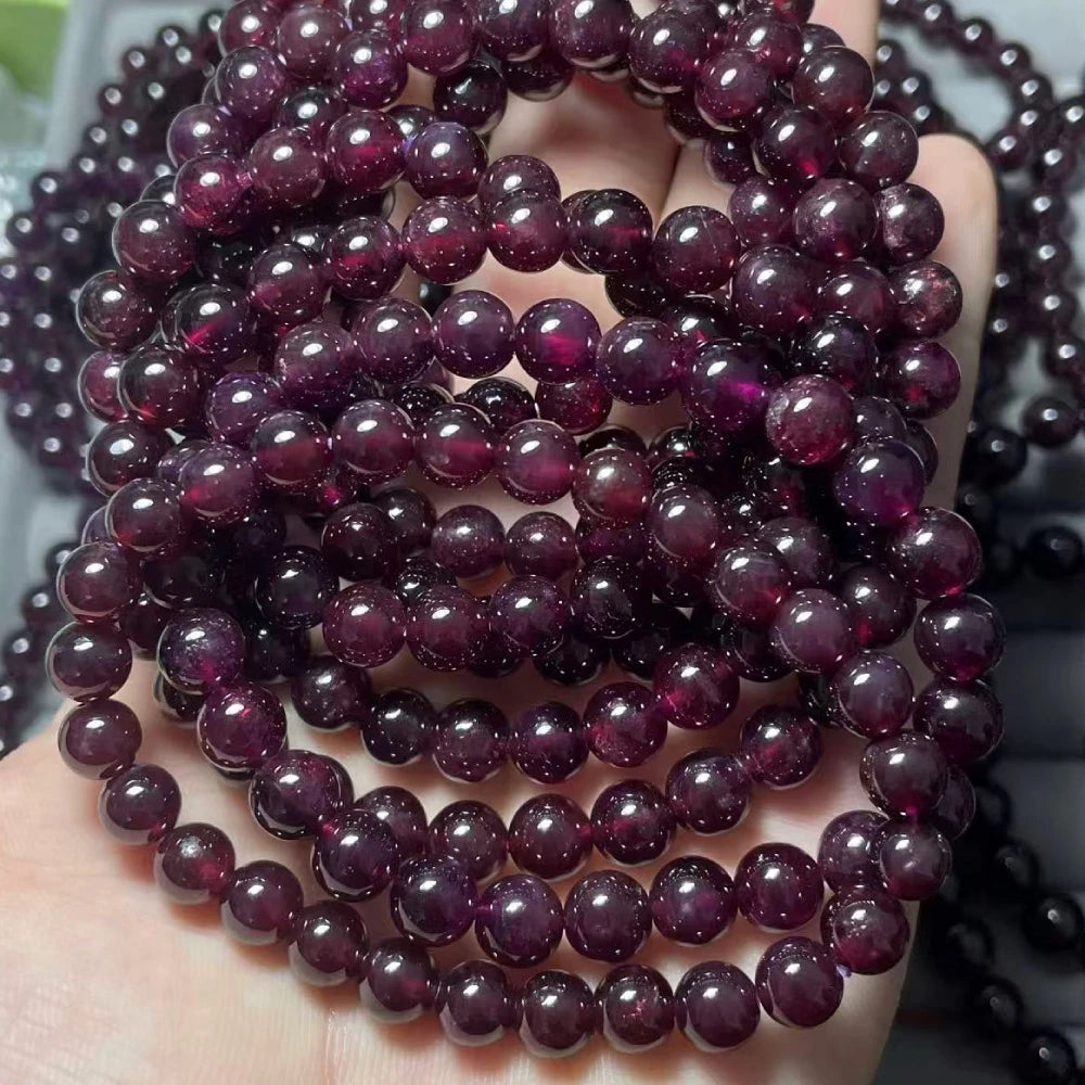 Ca. 7-8 mm natürliche rot-lila Granatarmbandperlen im Großhandel