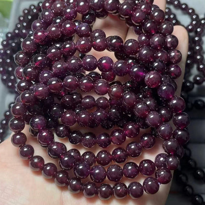 Ca. 7-8 mm natürliche rot-lila Granatarmbandperlen im Großhandel